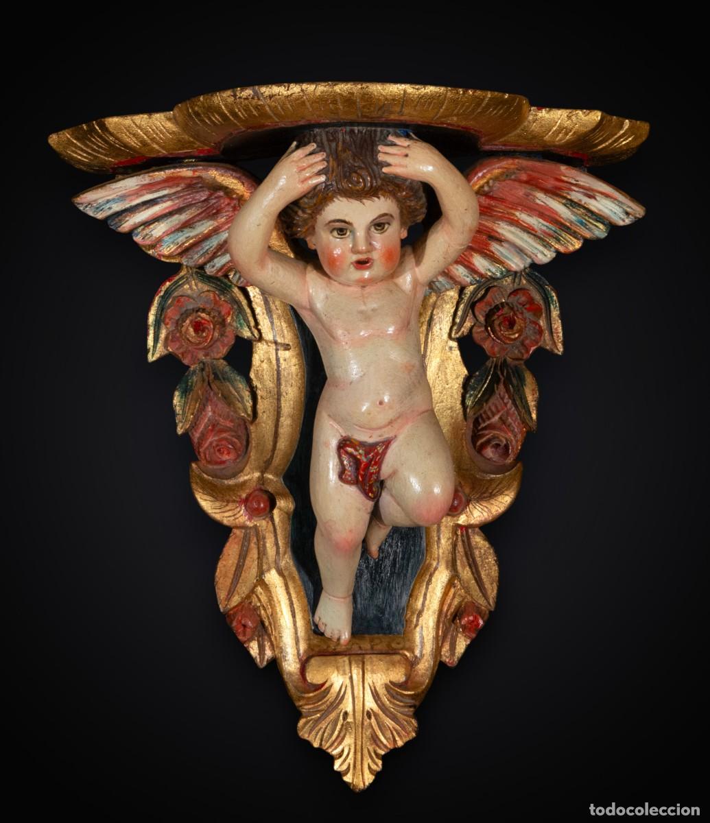 Art: M&eacute;nsula con putto alado en madera policromada, estilo Arte Mart&iacute;nez, siglo XX