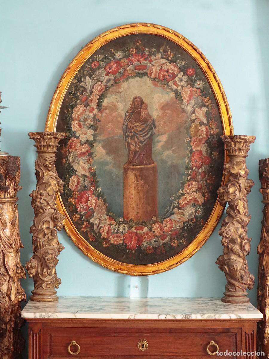 Arte: La Virgen del Pilar en una orla de flores. Siglos XVII-XVIII. Mide 105 x 78 cm.
