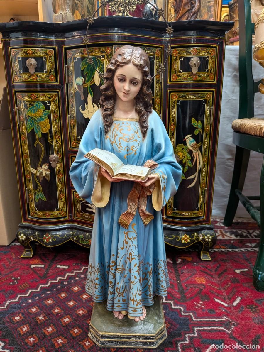 Arte: Escultura virgen ni&ntilde;a leyendo