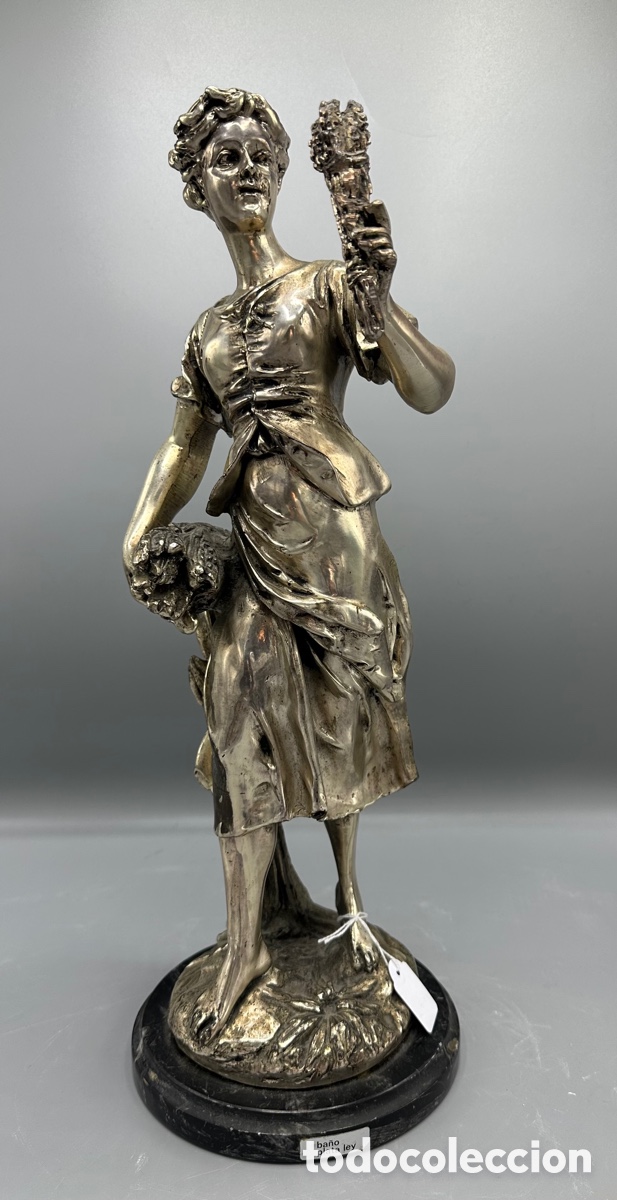 Arte: Escultura plateada - Foto 1