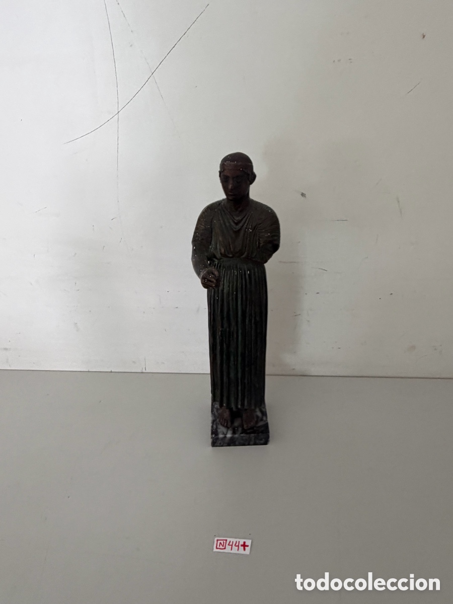 Arte: Escultura Auriga de Delfos.