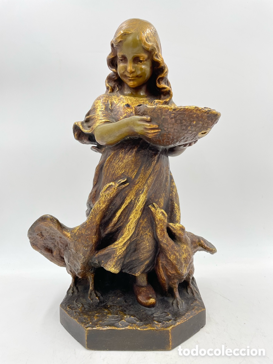 Arte: Escultura Ni&ntilde;a alimentando gansos. Sellada y numerada. Esteva y Cia. Barcelona. Estuco Policromado.