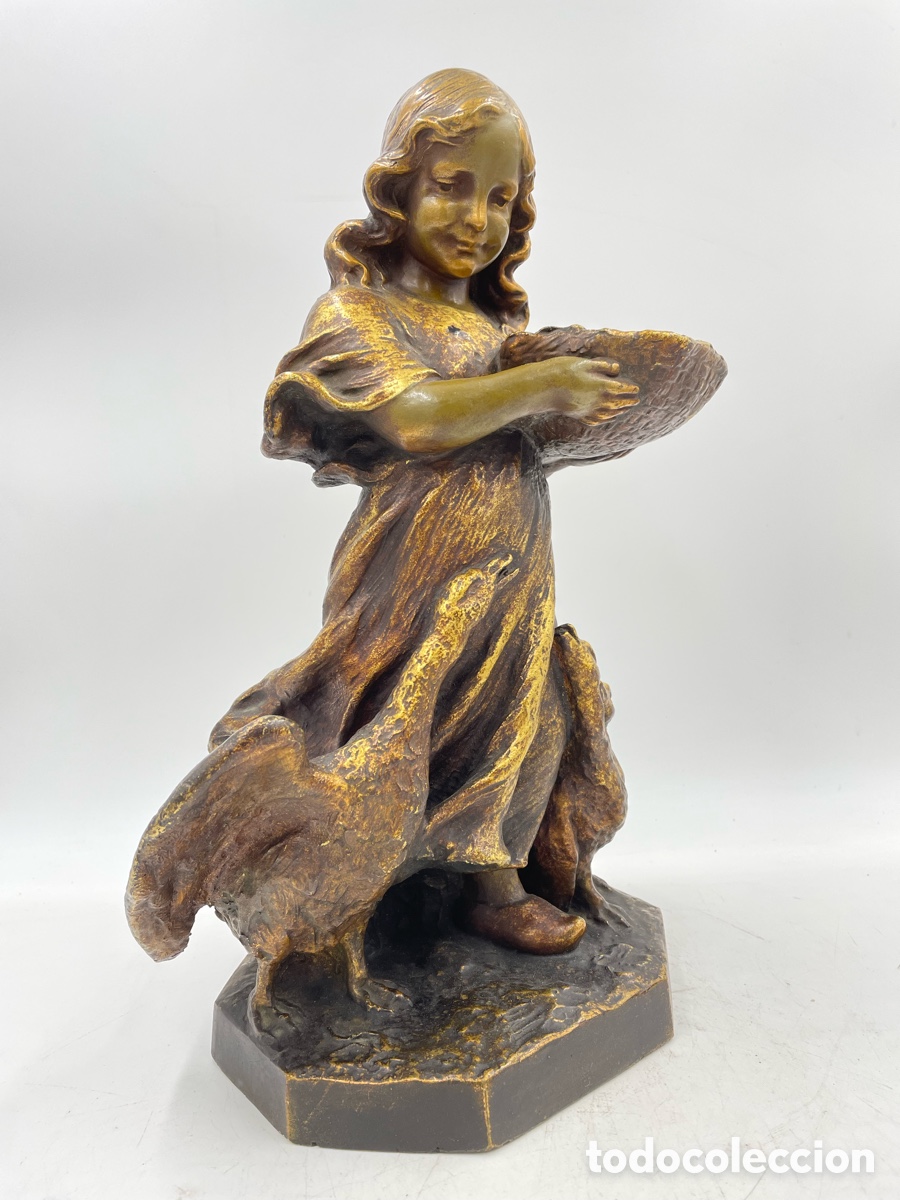 Arte: Escultura Ni&ntilde;a alimentando gansos. Sellada y numerada. Esteva y Cia. Barcelona. Estuco Policromado.
