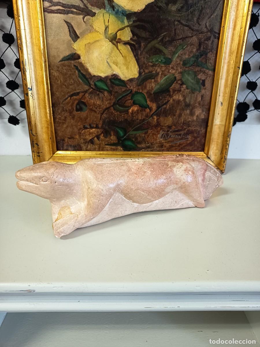 Arte: Escultura tallada animal