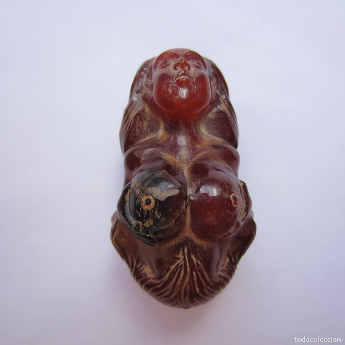 Arte: netsuke er&oacute;tico mujer tallado en cuerno de Jak