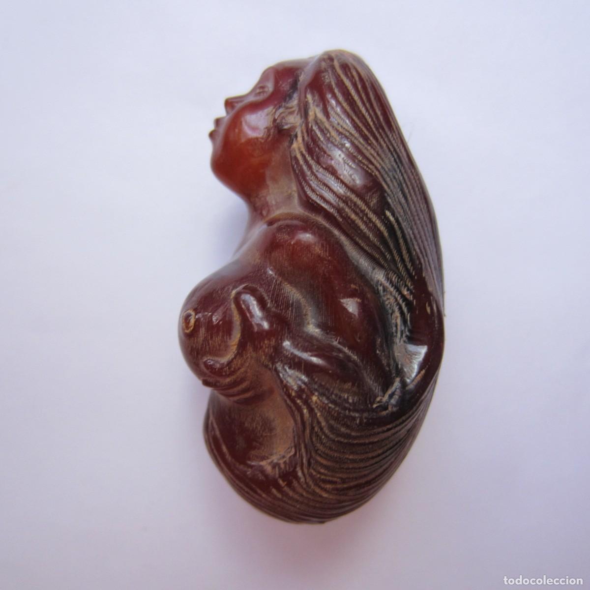 Arte: netsuke er&oacute;tico mujer tallado en cuerno de Jak