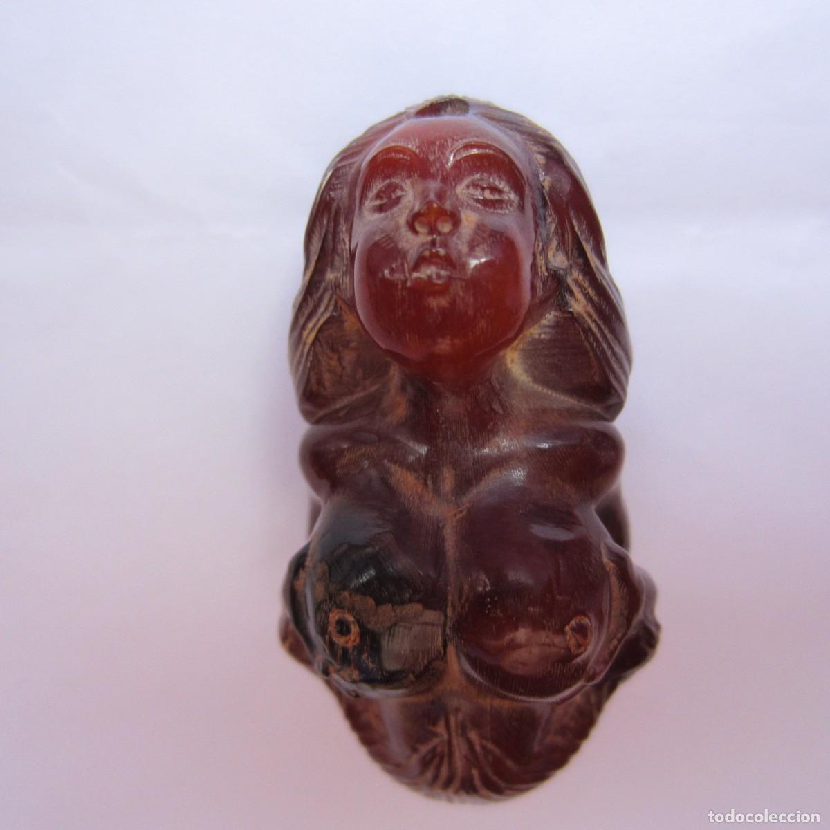 Arte: netsuke er&oacute;tico mujer tallado en cuerno de Jak