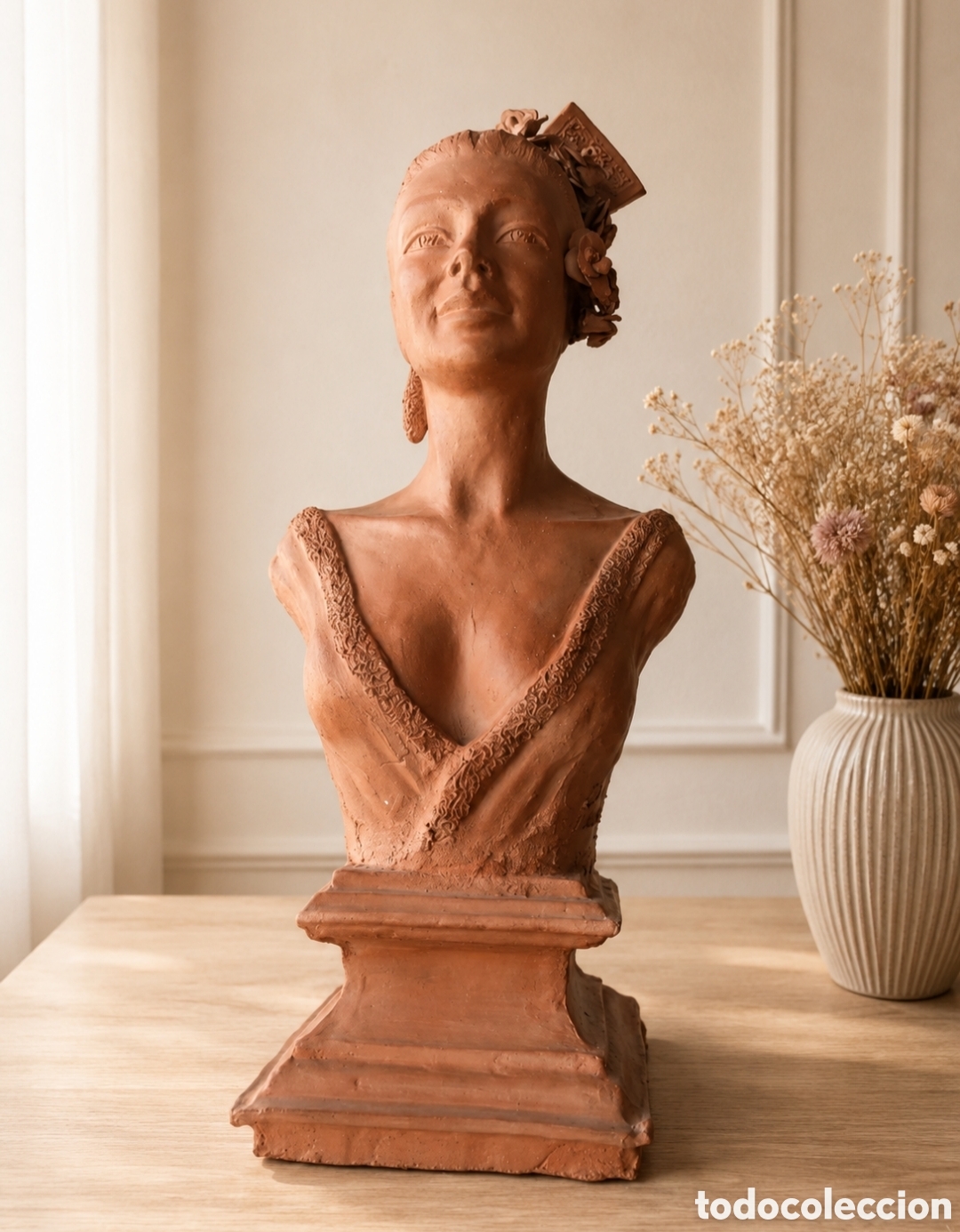 Arte: Busto de mujer de terracota