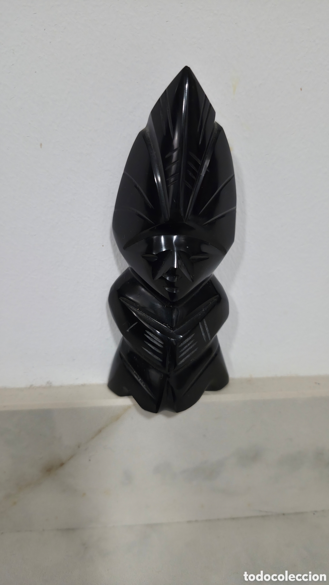 Arte: Peque&ntilde;o totem de obsidiana.