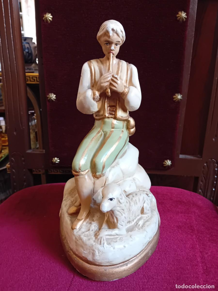 Art: Pastor tocando la flauta con oveja d&eacute;cada de los 50