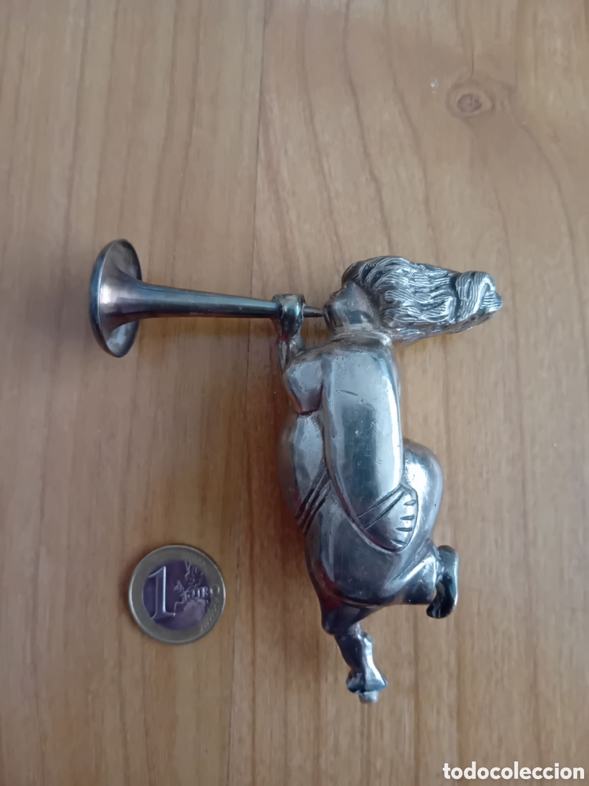 Arte: FIGURA PLATEADA. DIOSA FAMA, DISE&Ntilde;ADA POR ANTONIO MINGOTE. ES MET&Aacute;LICA Y PESA.