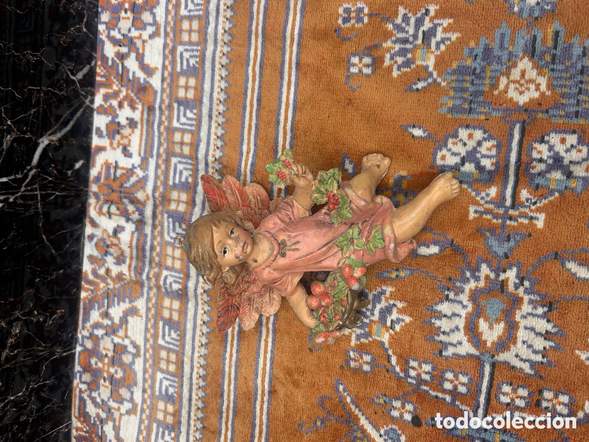 Arte: figura decorativa de un &aacute;ngel o querub&iacute;n