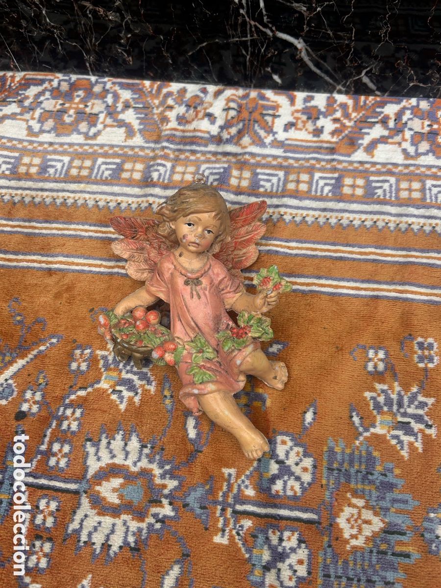 Arte: figura decorativa de un &aacute;ngel o querub&iacute;n