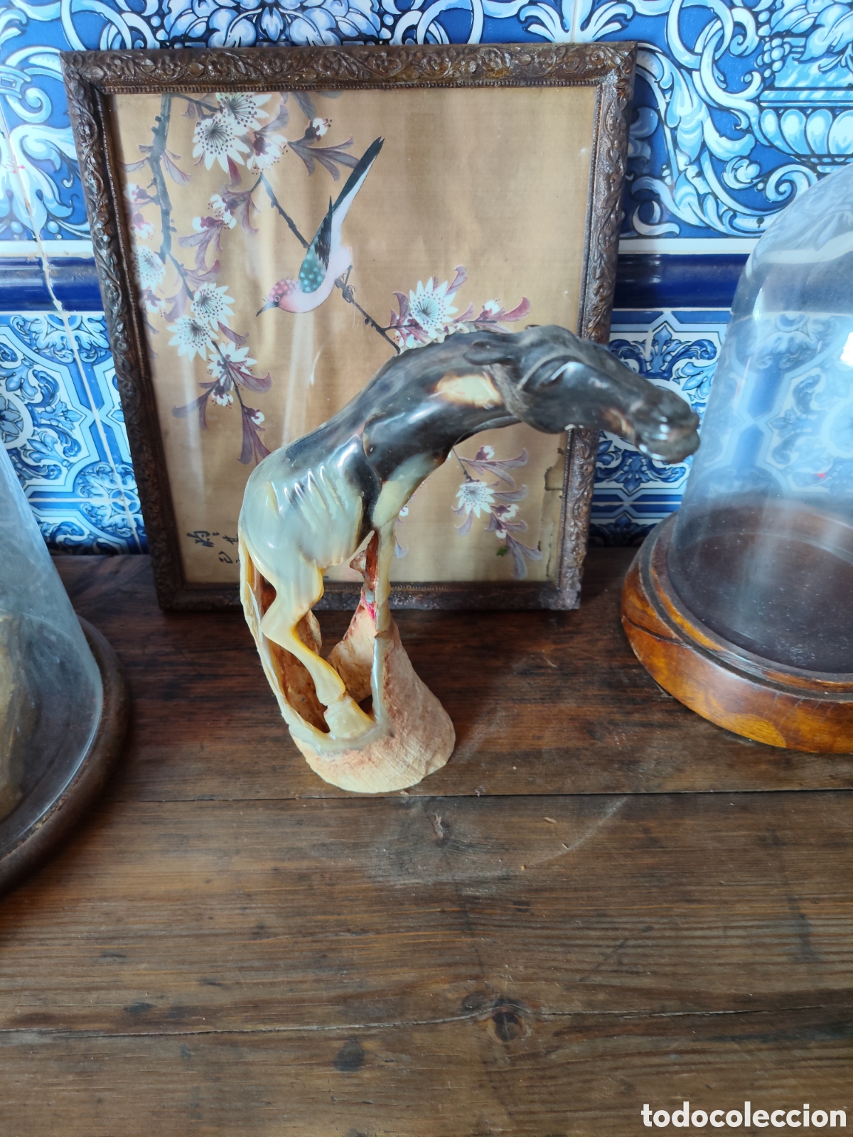 Arte: CABALLO TALLADO EN ASTA DE TORO