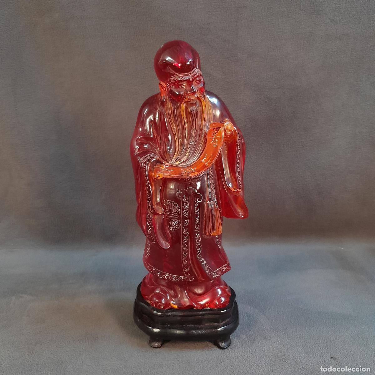 Arte: FIGURA DE SHOUXING EN &Aacute;MBAR TALLADO. SIGLO XX