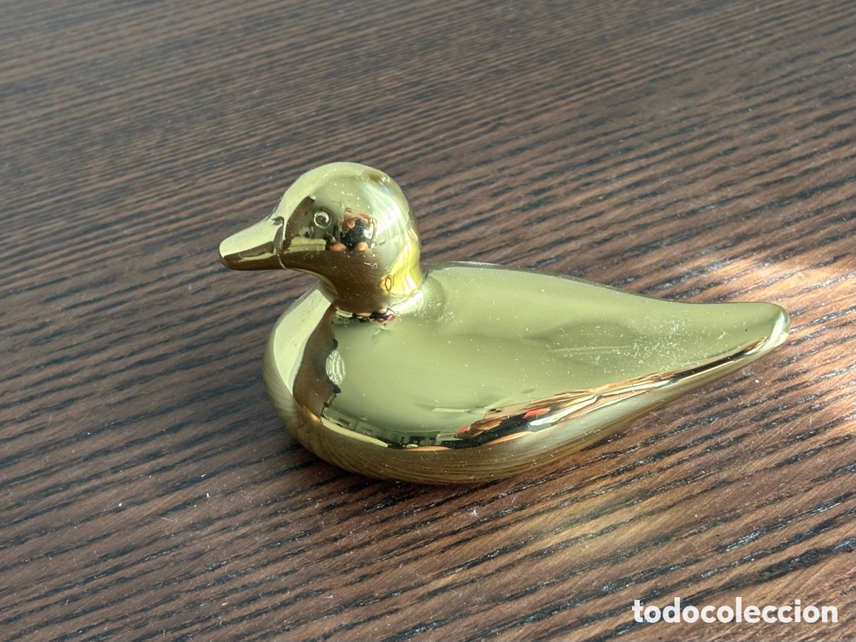 Arte: Peque&ntilde;a Figura pato dorado