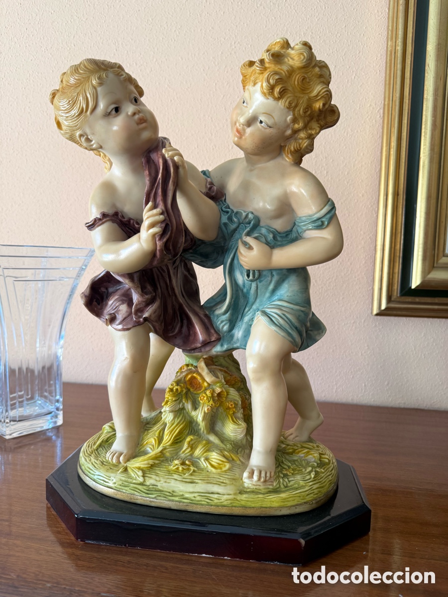 Arte: Escultura ni&ntilde;os antiua