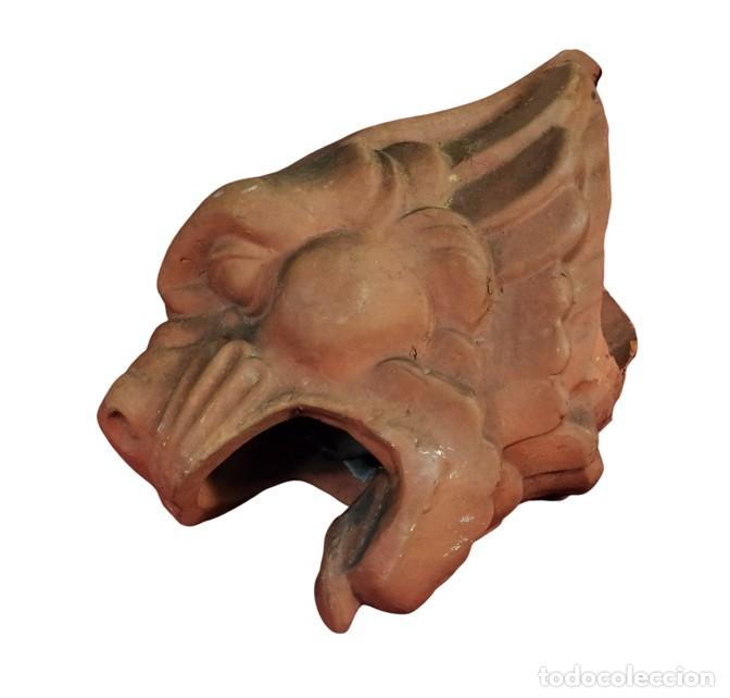 Arte: CABEZA DE G&Aacute;RGOLA. TERRACOTA. EUROPA. SIGLOS XIX-XX.