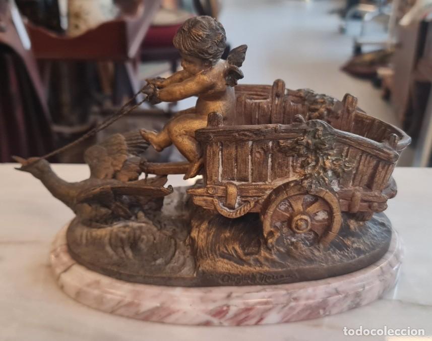 Arte: Putto alado en carro tirado por oca, firmado Auguste Moreau, spelter y m&aacute;rmol rosa, Francia c. 1900