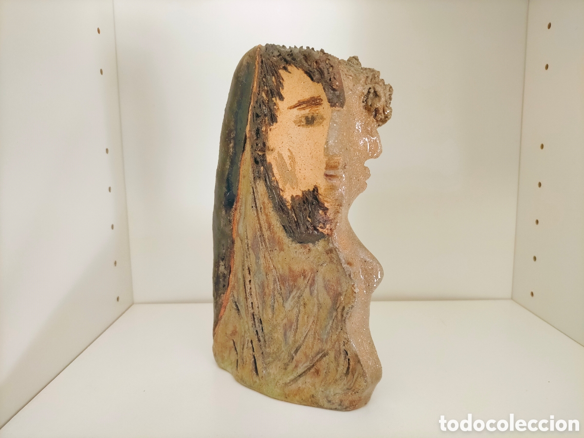 Arte: Escultura artesanal dos rostros