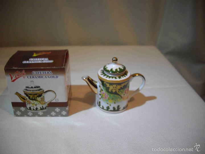 Artesan&iacute;a: CUATRO CAFETERAS PORCELANA - Foto 1
