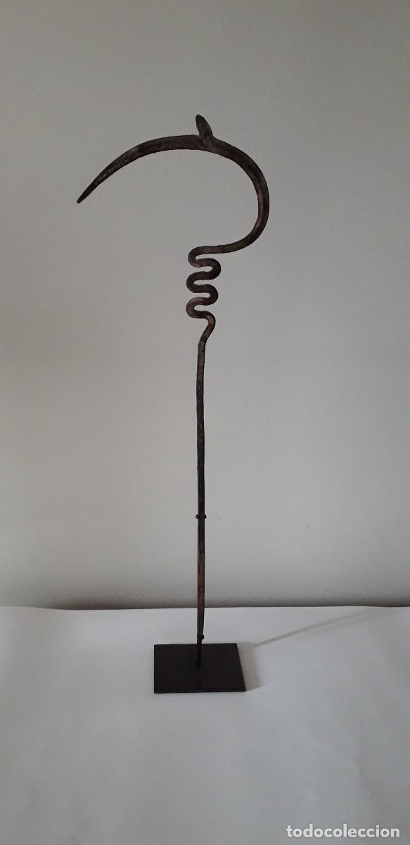 Artesan&iacute;a: Moneda tradicional africana, hierro negro