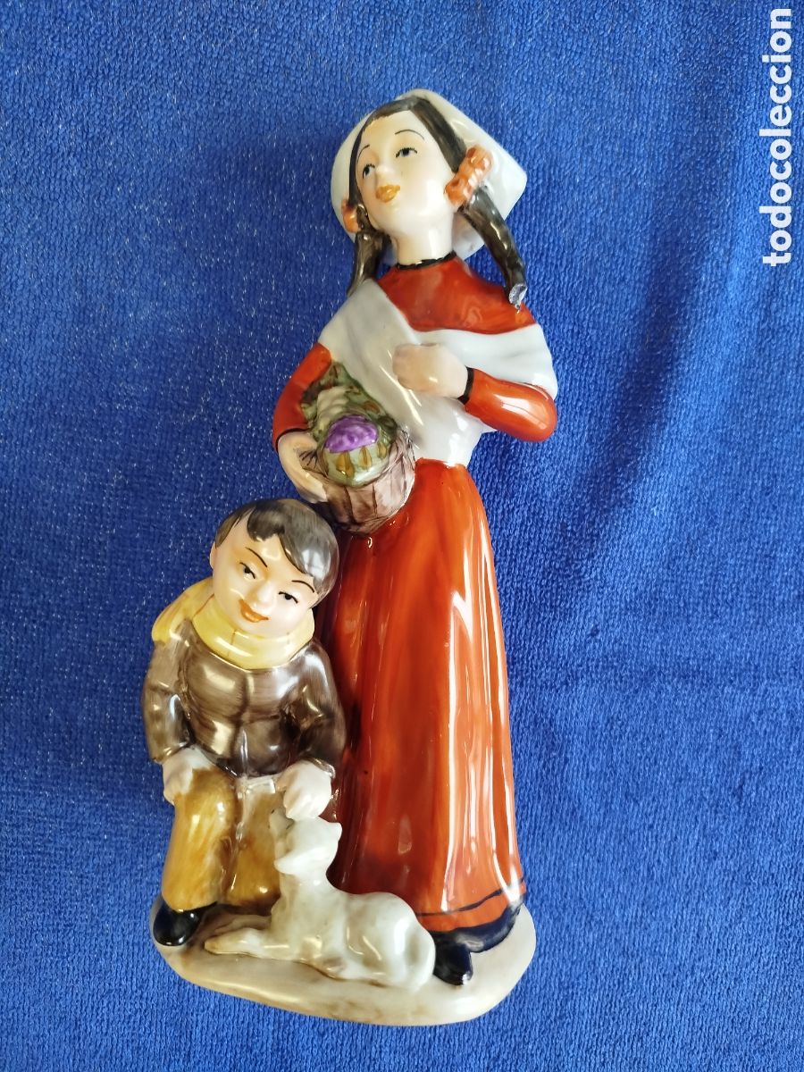 Artesan&iacute;a: Figura de cer&aacute;mica mujer holandesa con ni&ntilde;o y perro