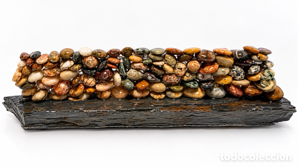 Artesan&iacute;a: Cordillera 5. Realizada con piedras del Mediterr&aacute;neo sobre una piedra de la Alpujarra.