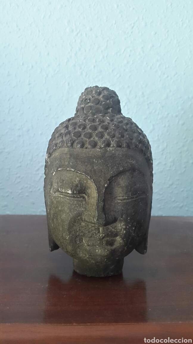 Artisanat: Cabeza de buda en piedra