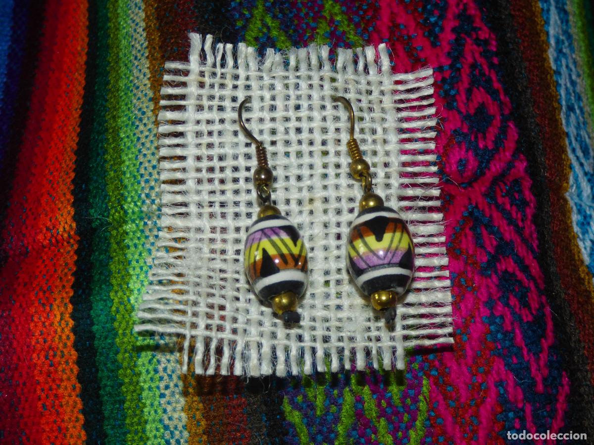 Artesan&iacute;a: Pendientes artesanos.