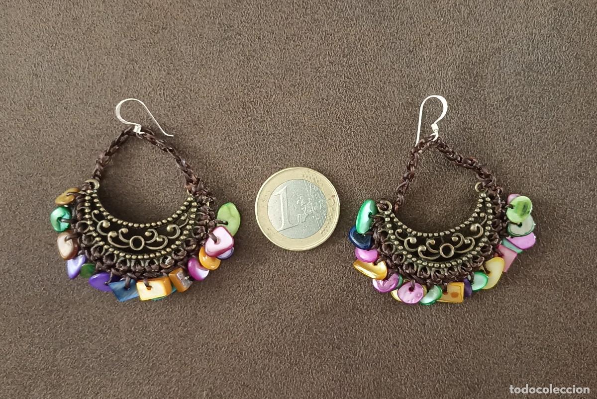 Artesan&iacute;a: Pendientes de artesan&iacute;a con n&aacute;car.