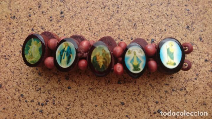 Artesan&iacute;a: Pulsera Santos madera - Foto 2