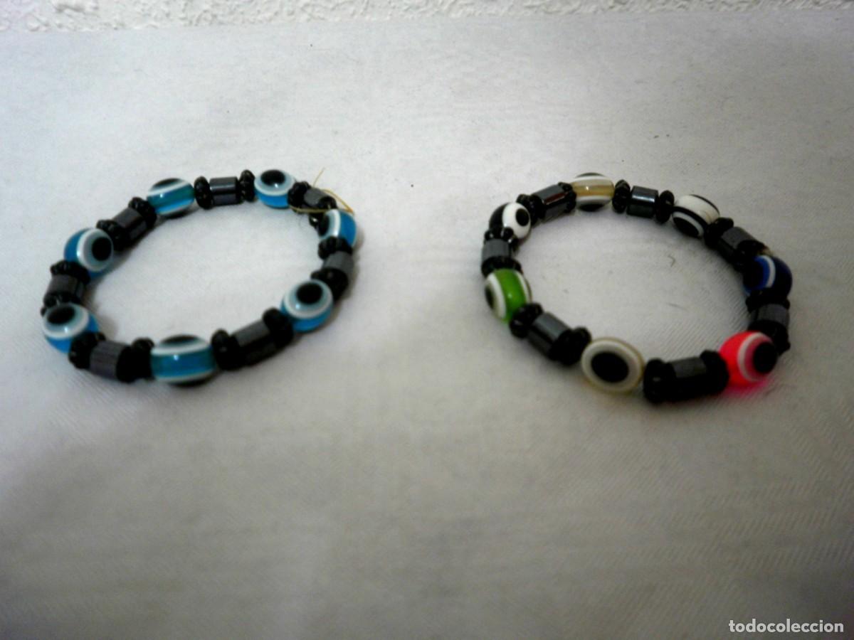 Artisanat: Lote dos pulseras con el ojo turco