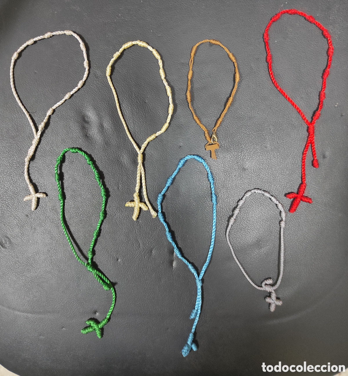 Artesan&iacute;a: Pack de 7 pulseras hechas a mano con Cruz
