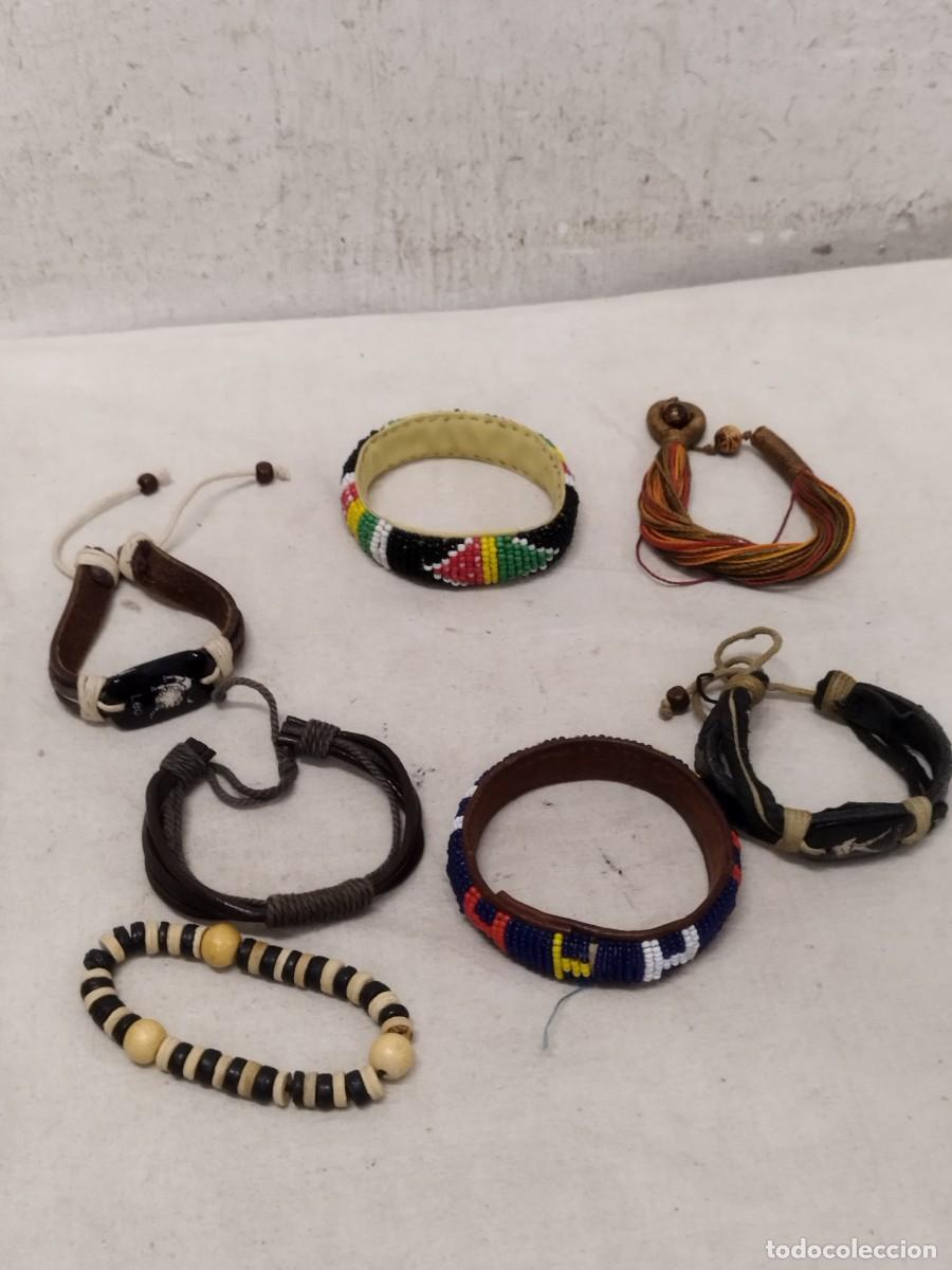 Artesan&iacute;a: Lote de 7 pulseras etnicas. Y horoscopos, leo y acuario.