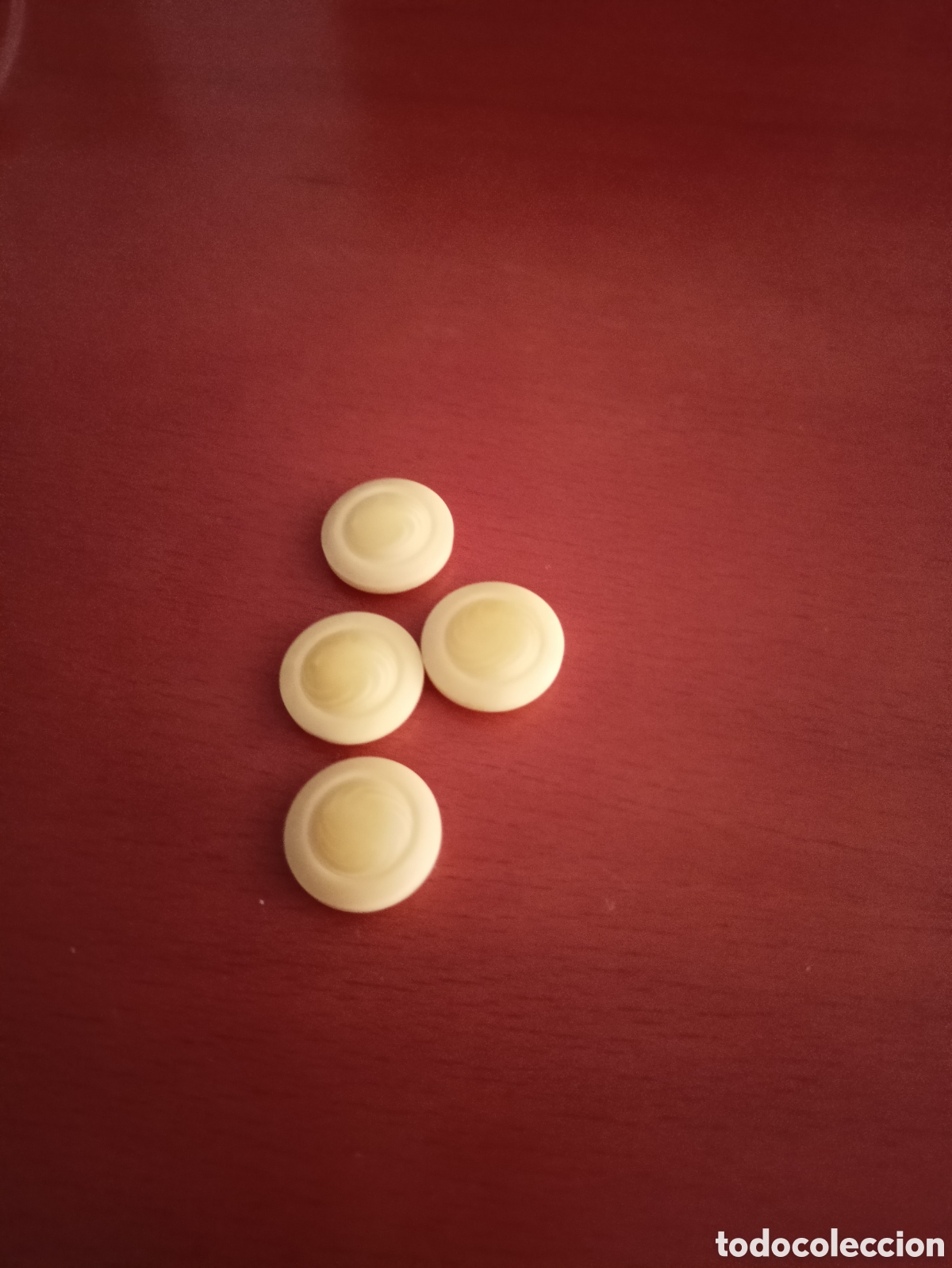 Artesan&iacute;a: 4 botones amarillo jaspeado