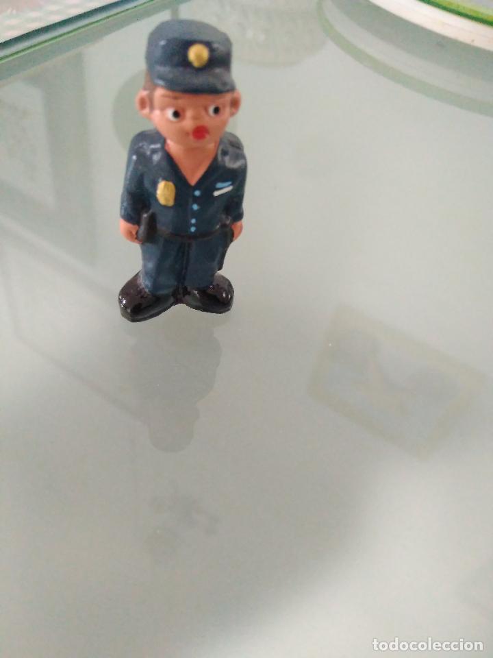 muñeco de policia nacional 5 cm en todocoleccion - 141450098