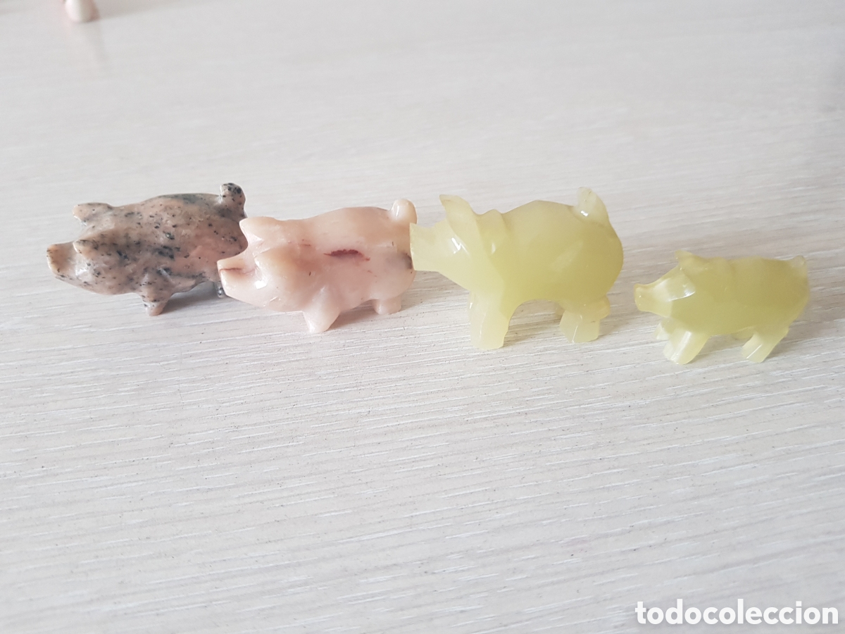 Artesan&iacute;a: Cerdos tallados en piedra - Foto 1