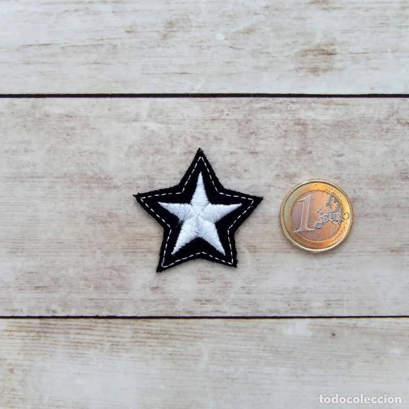 Handicraft: Estrella bordada en hilo de plata