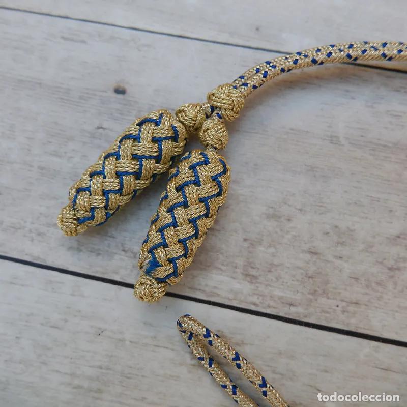 Handicraft: Cord&oacute;n bast&oacute;n de mando color oro y azul