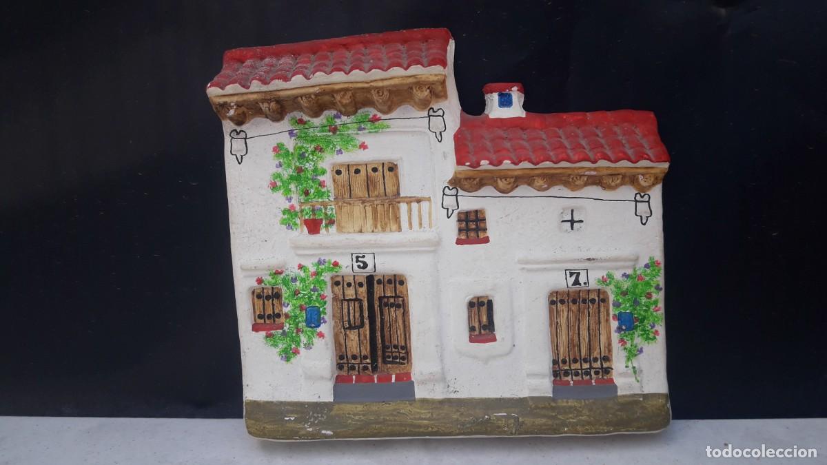 Artesan&iacute;a: Fachada de casitas de Arquitectura popular. Terracota
