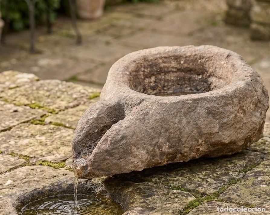 Artesan&iacute;a: Pila r&uacute;stica de piedra tallada a mano tradicional