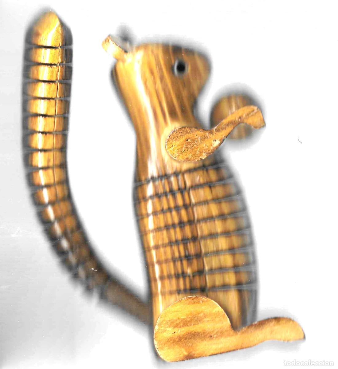Artesan&iacute;a: Artesan&iacute;a en madera barnizada articulada