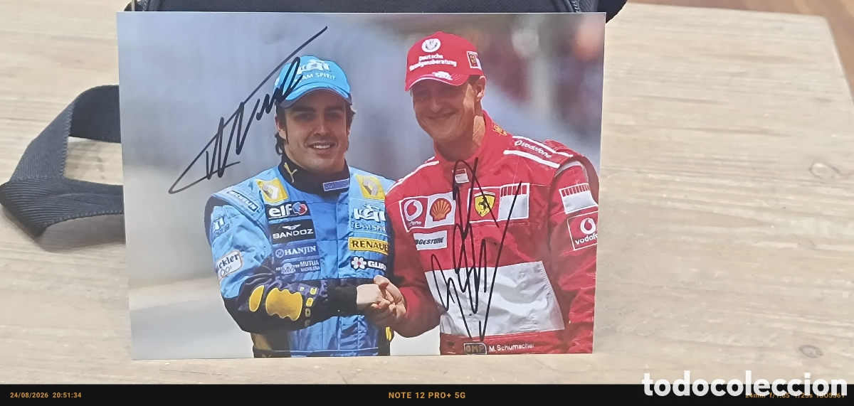 Coleccionismo deportivo: Foto firmada Fernando Alonso y Michael Schumacher