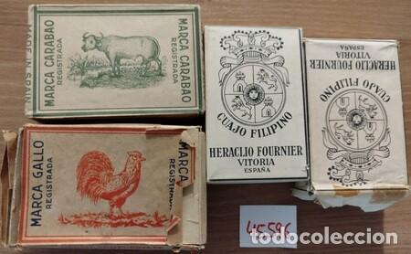 Barajas de cartas: CUAJO FILIPINO. Lote de cuatro barajas: 'CARABAO', 'GALLO' y dos de 'FOURNIER', en sus envueltas