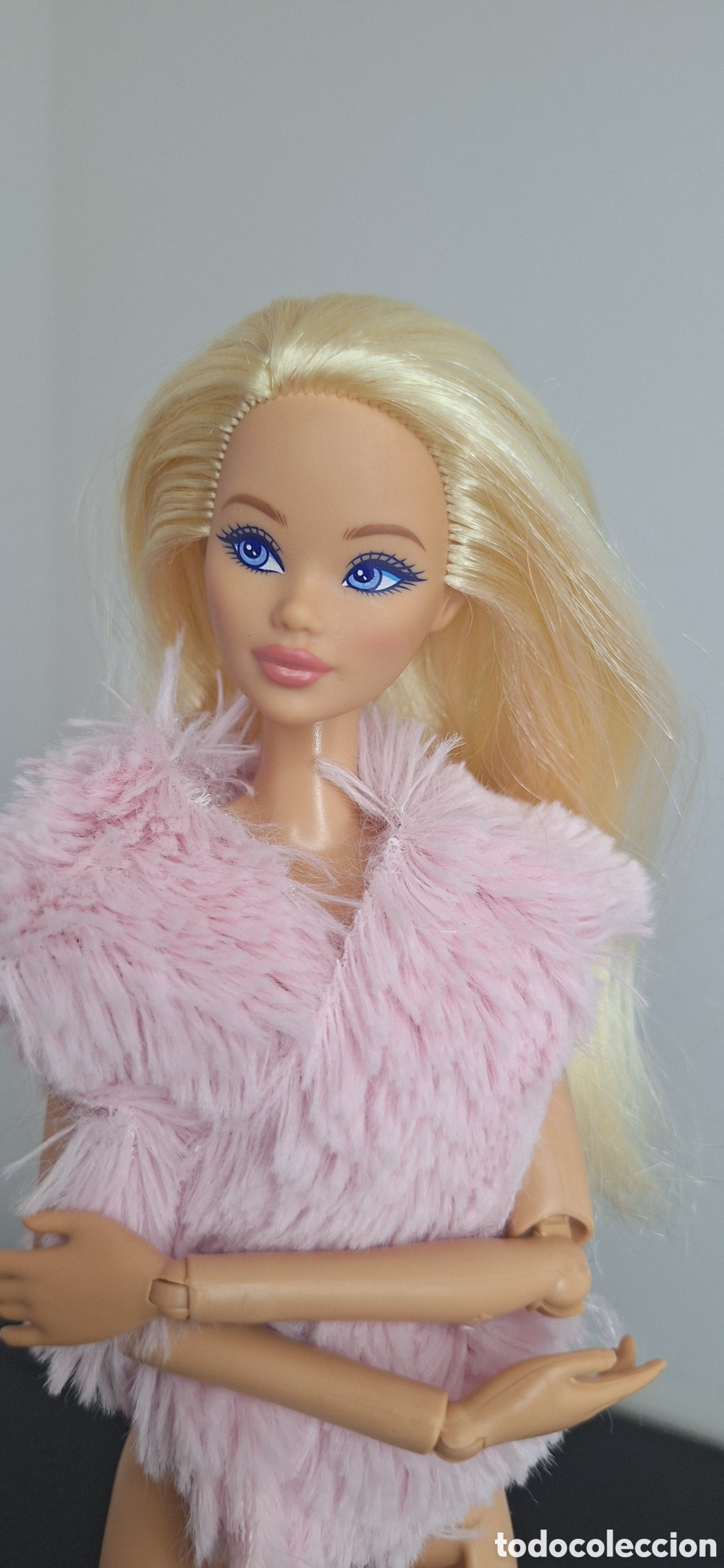 Barbie y Ken: chaleco de pelo valido para Barbie
