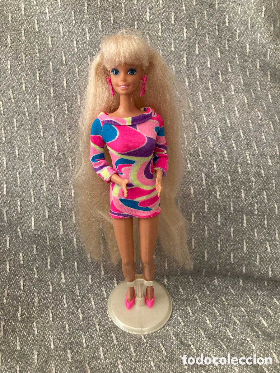 Barbie y Ken: Mu&ntilde;eca Barbie Mil peinados