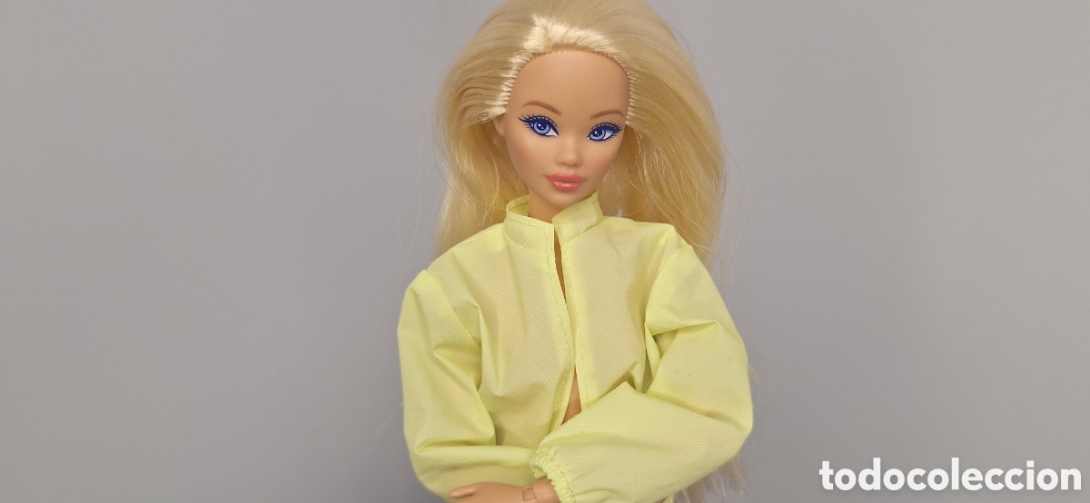 Barbie and Ken: chaqueta Christie dia y lluvia