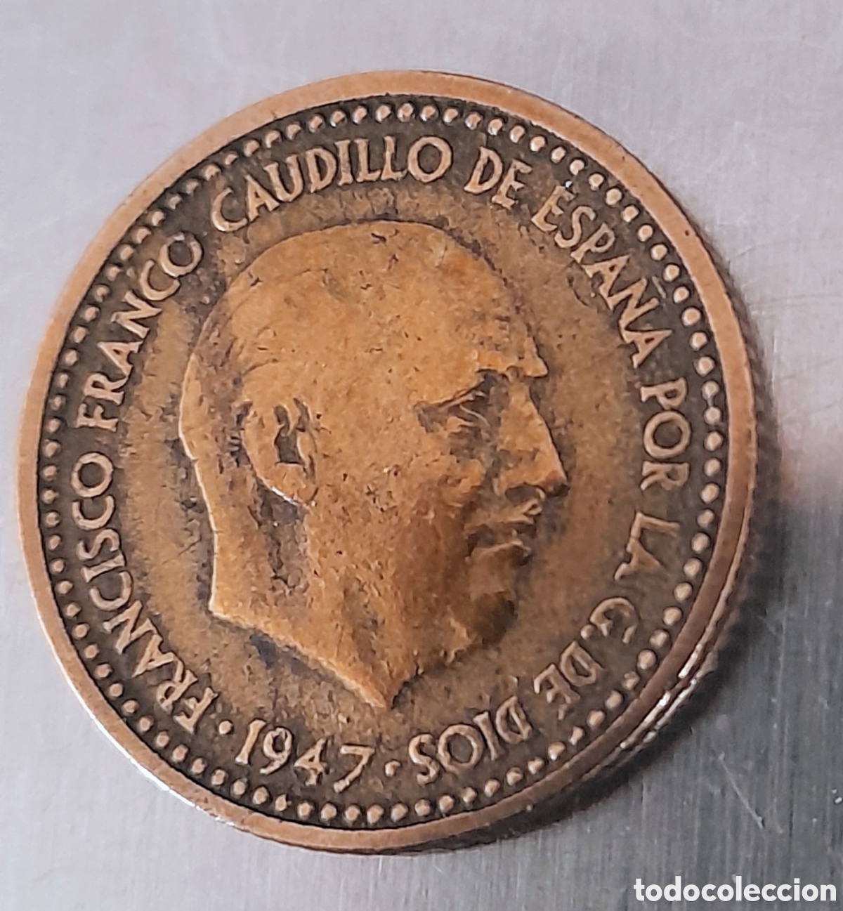 Billetes con errores: 1 Peseta 1947 *19 *52 Error en Cara y Exceso Metal)