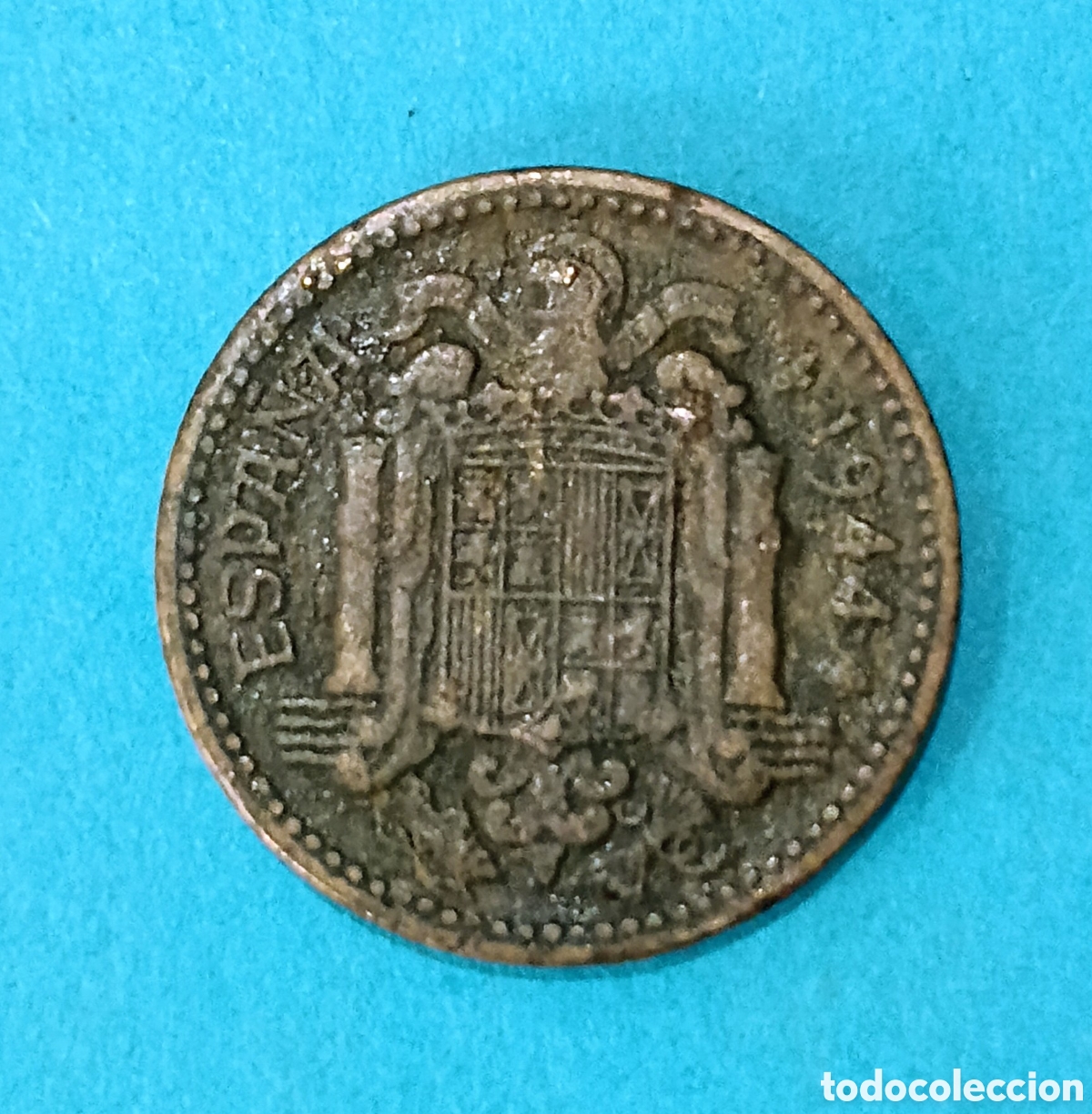 Billetes con errores: 1 Peseta Estado Espa&ntilde;ol 1944 con error de acu&ntilde;aci&oacute;n ( Exceso de Metal)